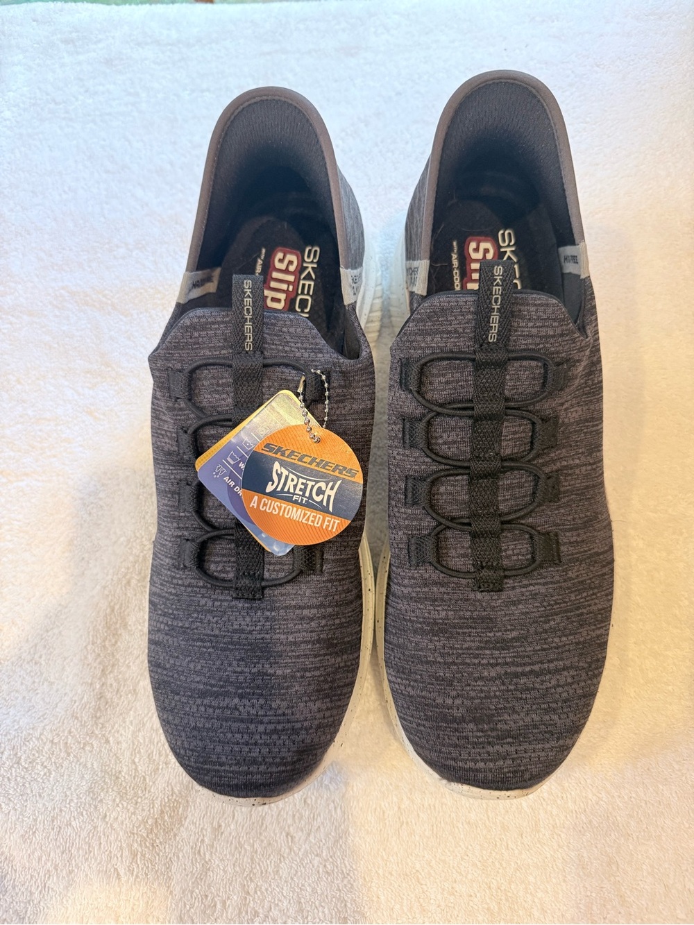 Skechers Slip-On Knit Sneakers in Heathered Charcoal and Black
